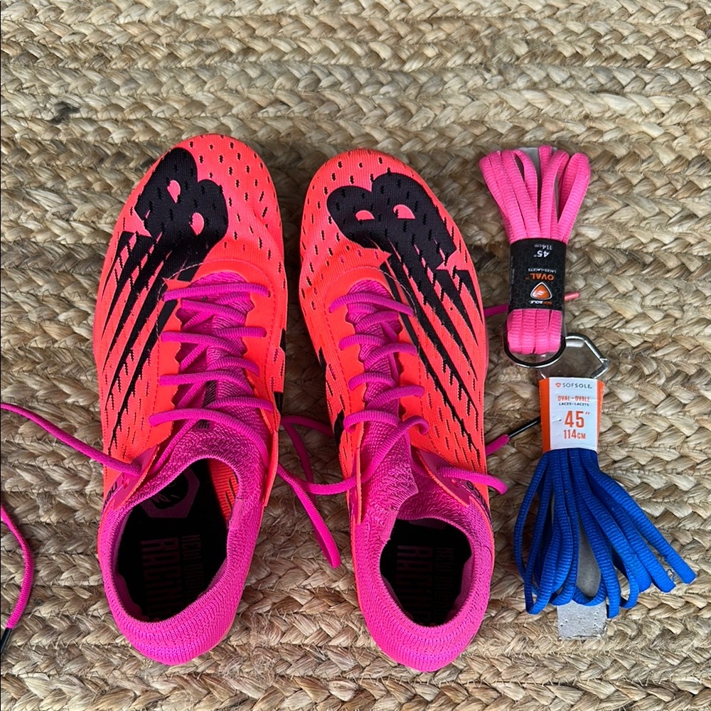 New Balance Pink and Orange racing spike shoes